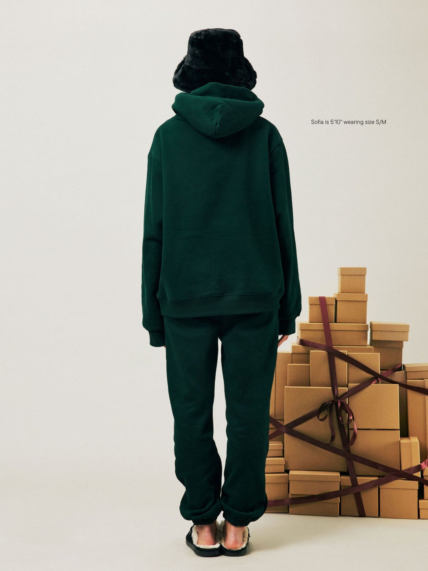 girl wearing Holiday Drawstring Unisex Sweatpants -forest