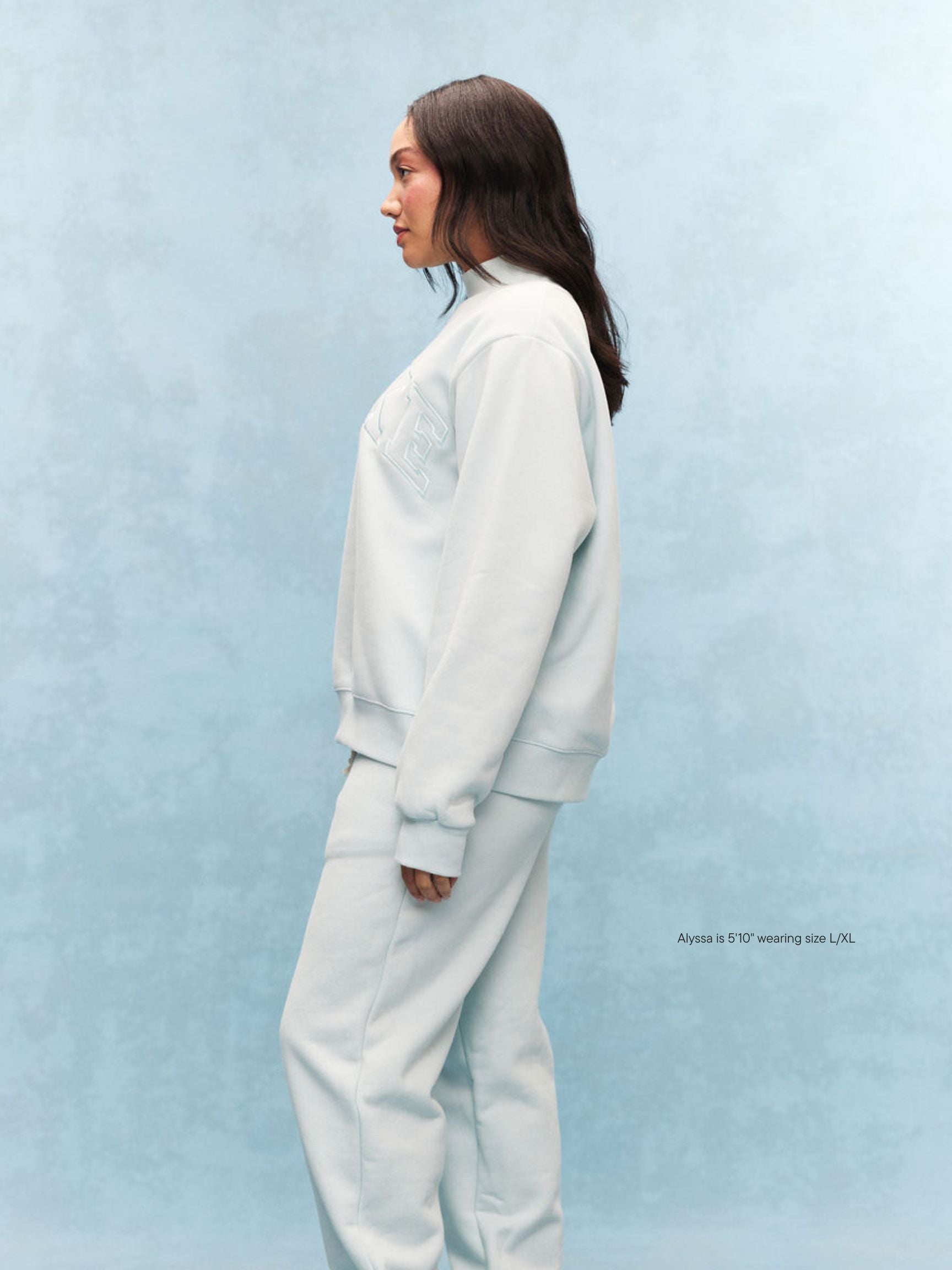 girl wearing Monochrome Varsity Mockneck -arctic