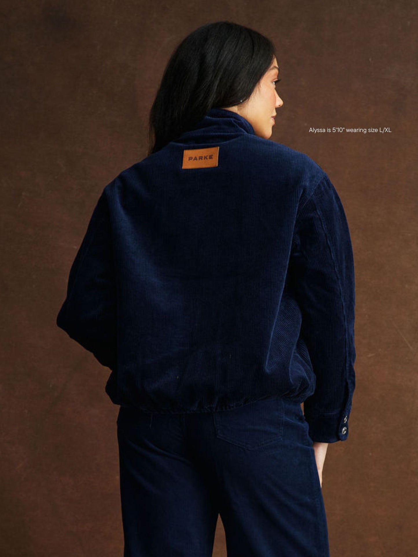 girl wearing Corduroy Lined Bomber Jacket -navy corduroy