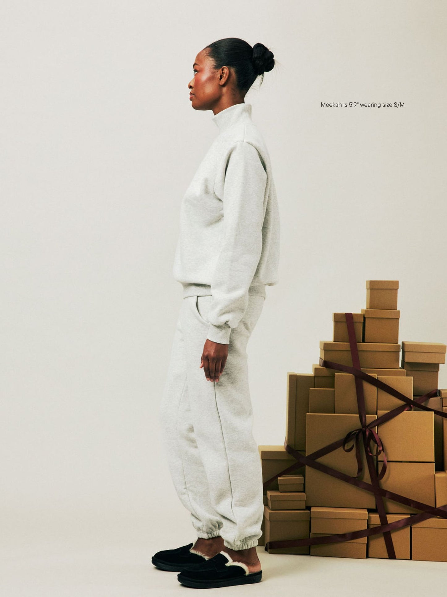 girl wearing Holiday Drawstring Unisex Sweatpants -classic grey