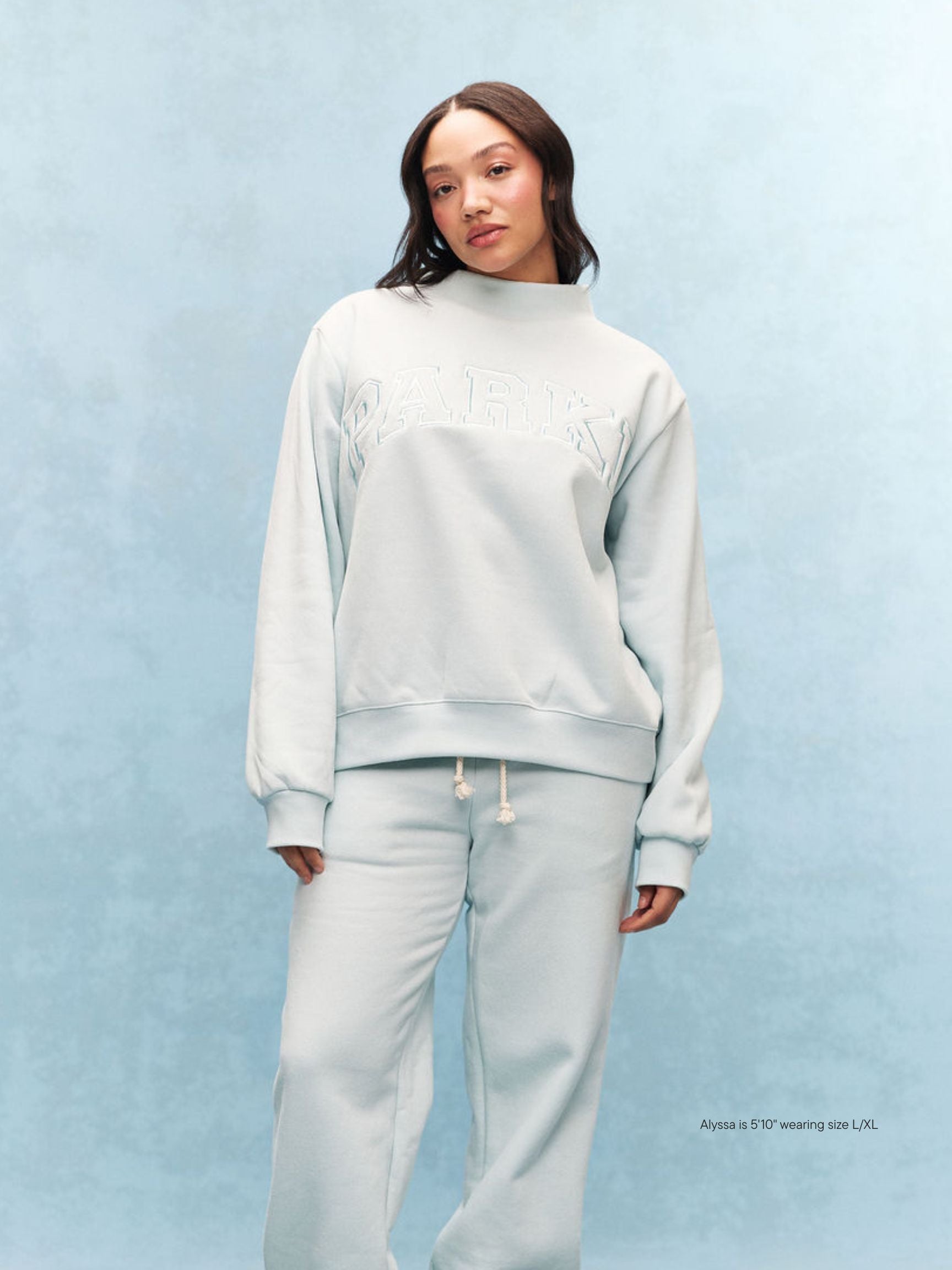 girl wearing Monochrome Varsity Mockneck -arctic