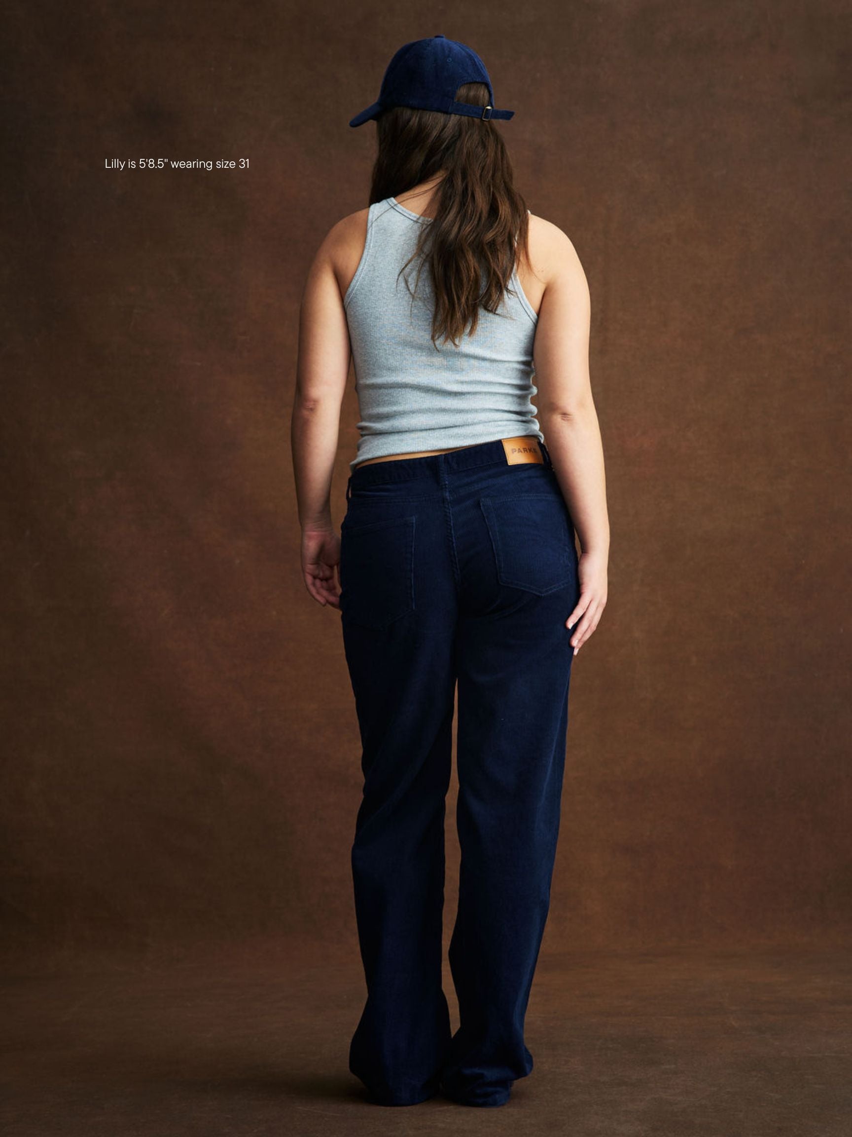 girl wearing Classic Straight Pants -navy corduroy