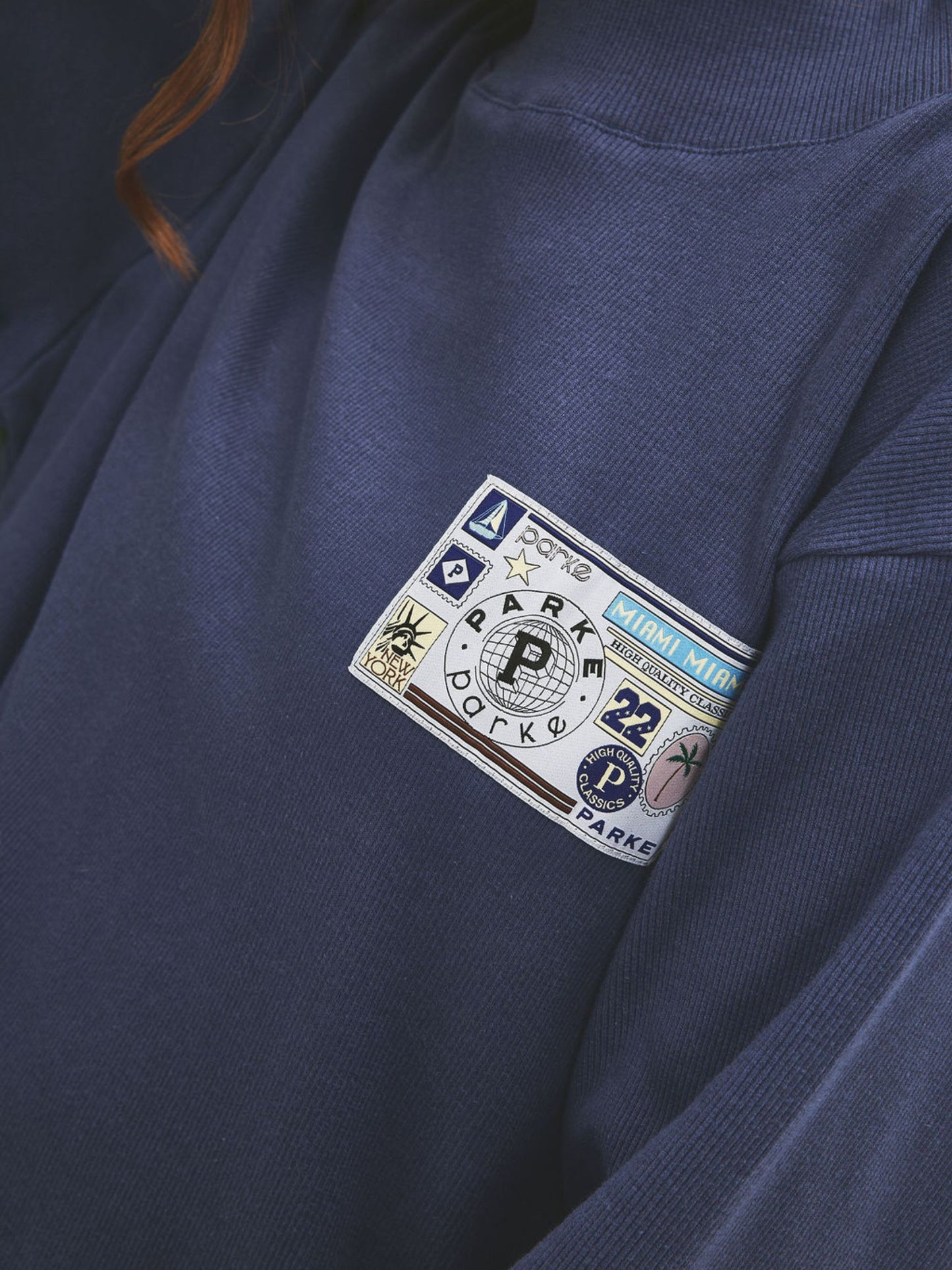 girl wearing Ribbed Pullover With Nostalgia Patch -crown