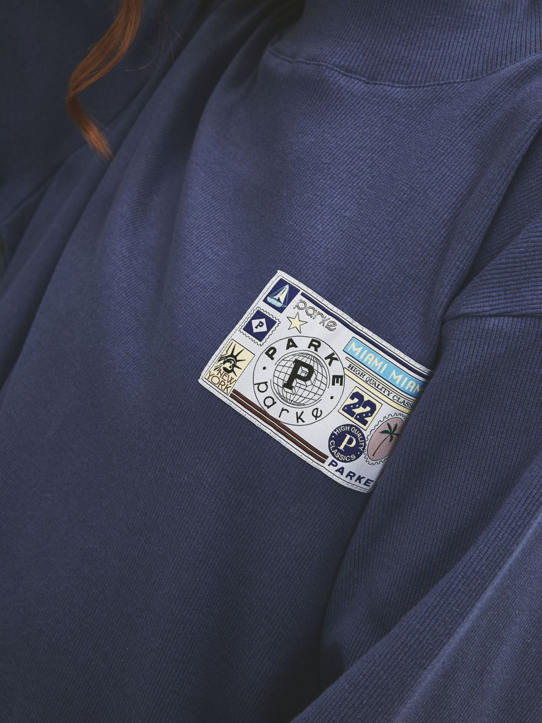 girl wearing Ribbed Pullover With Nostalgia Patch -crown