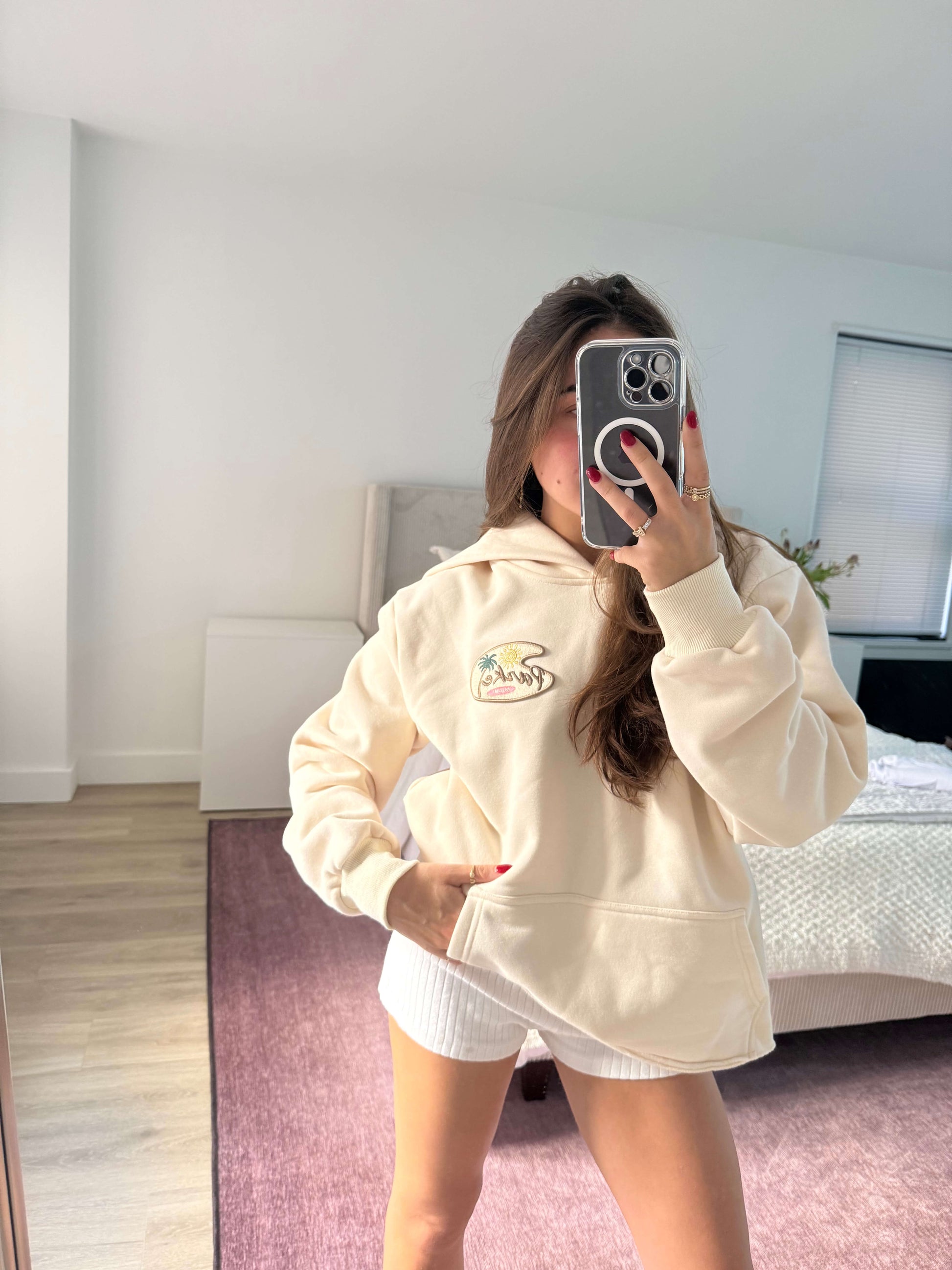 girl wearing bayside hoodie - cream