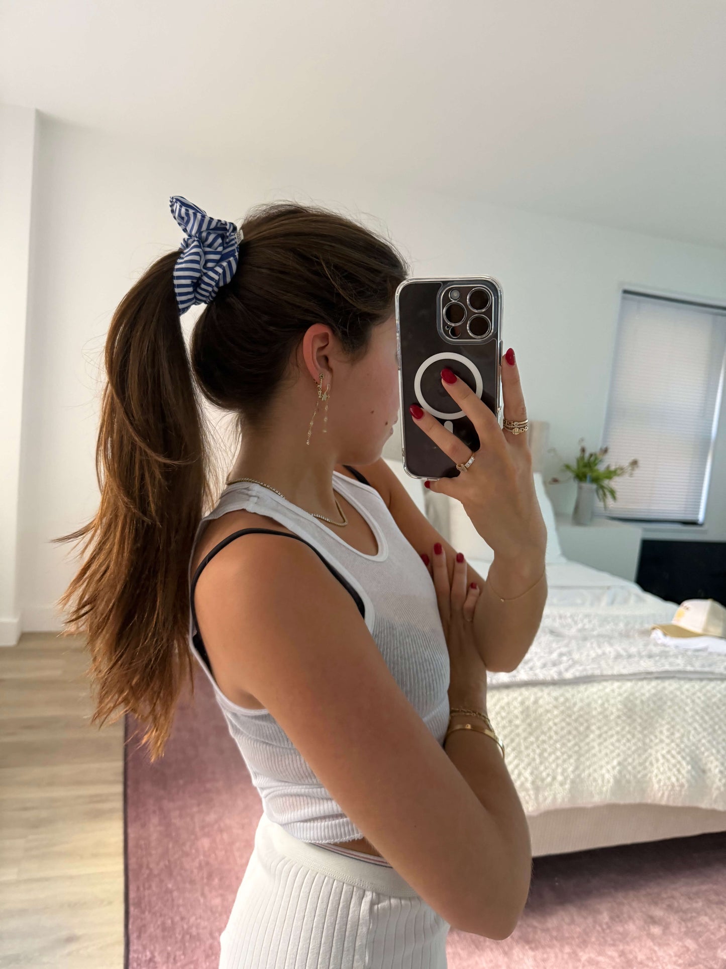 girl wearing blue stripe scrunchie -blue stripe