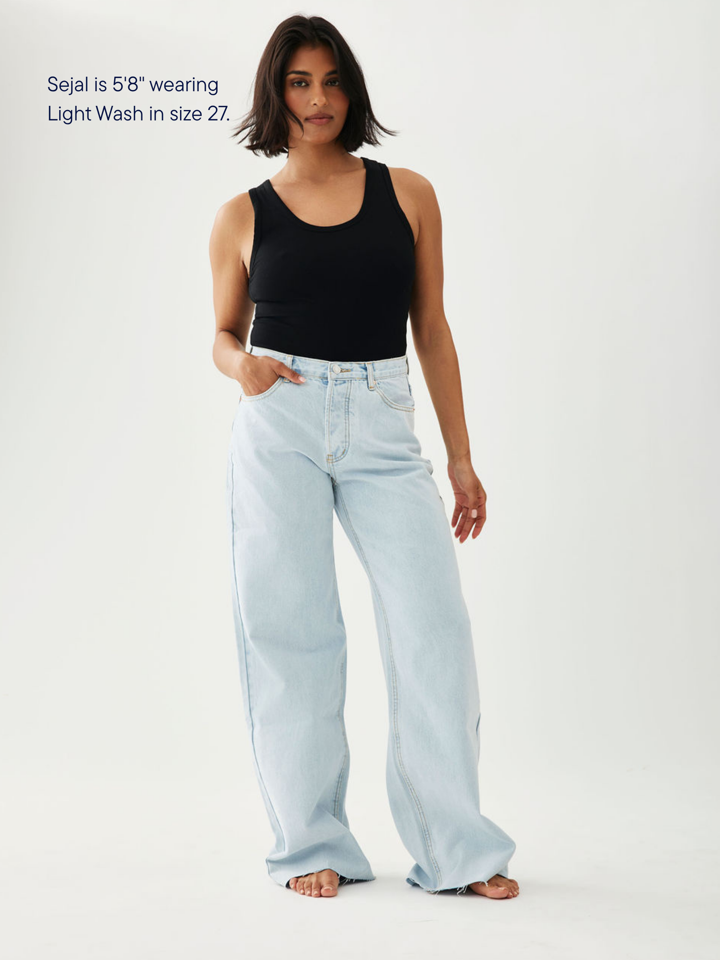 girl wearing low rise baggy jean -light wash