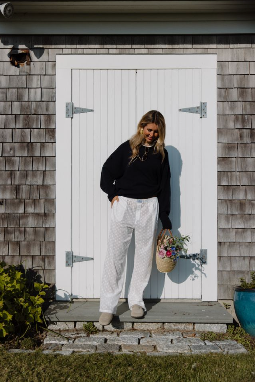 model wearing eyelet boxer pant in front of door- white eyelet