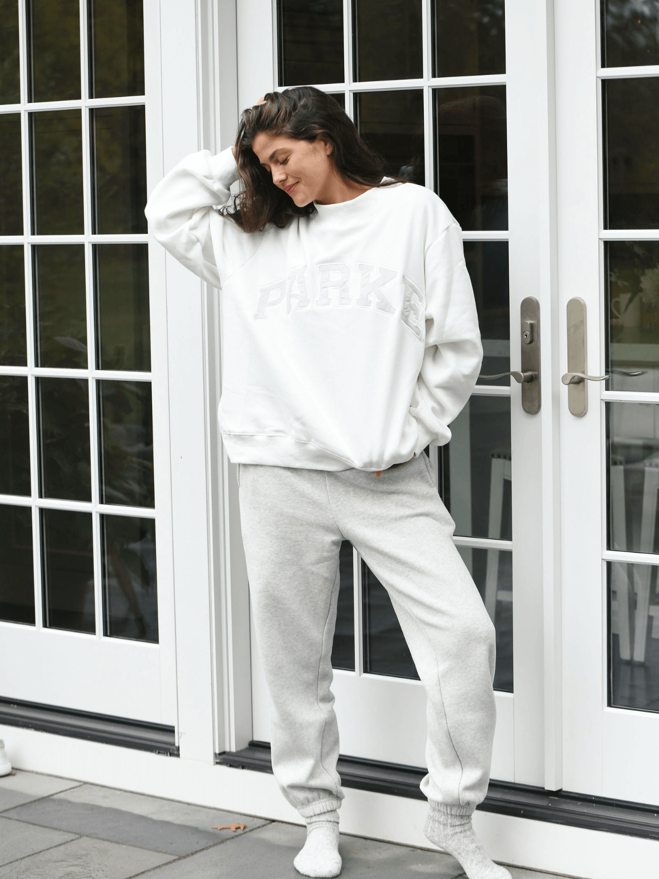 model wearing unisex sweats - classic grey 