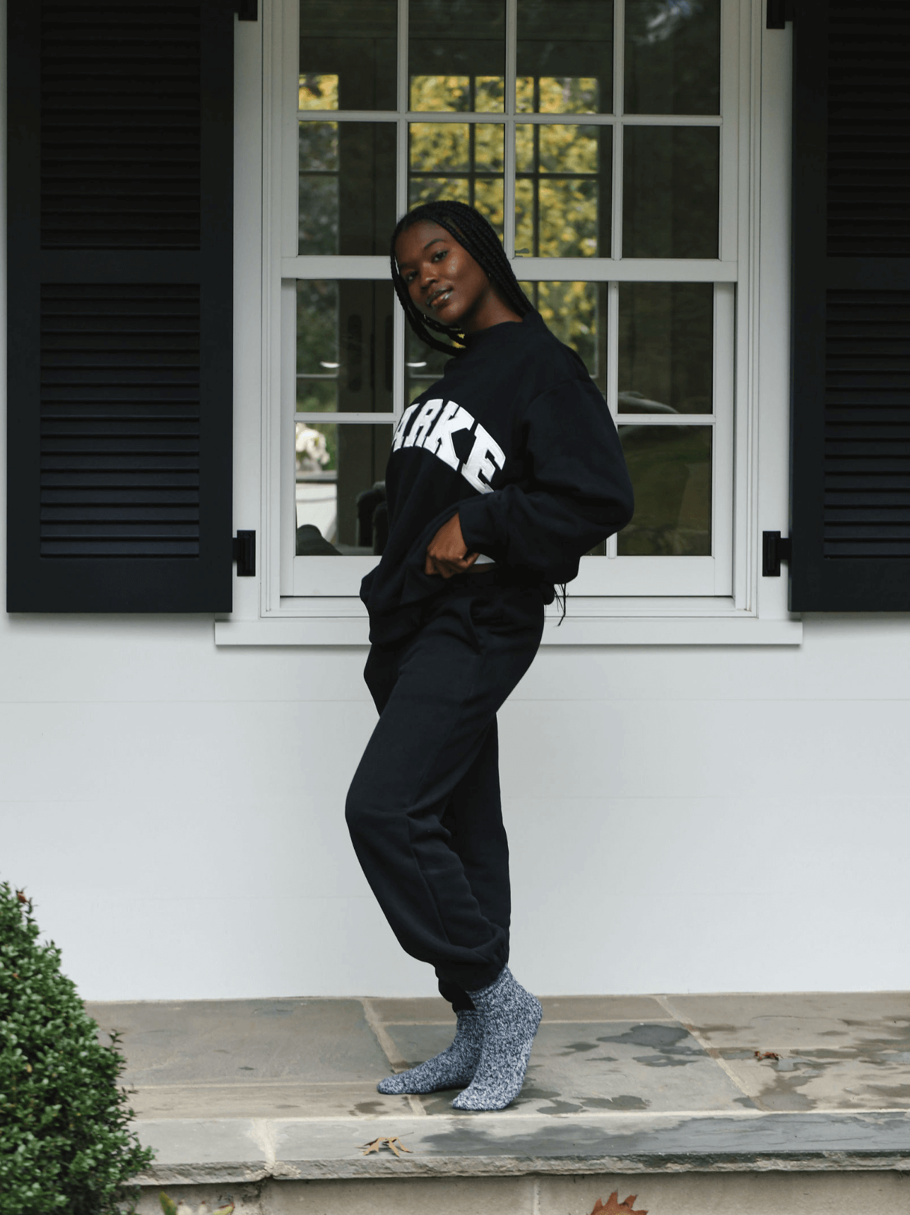 model wearing unisex sweats - black