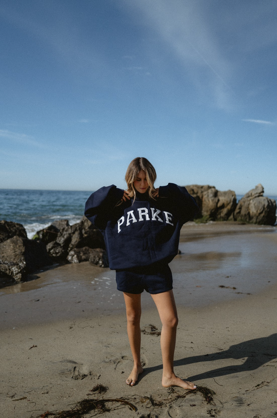 model wearing varsity mockneck - navy + white