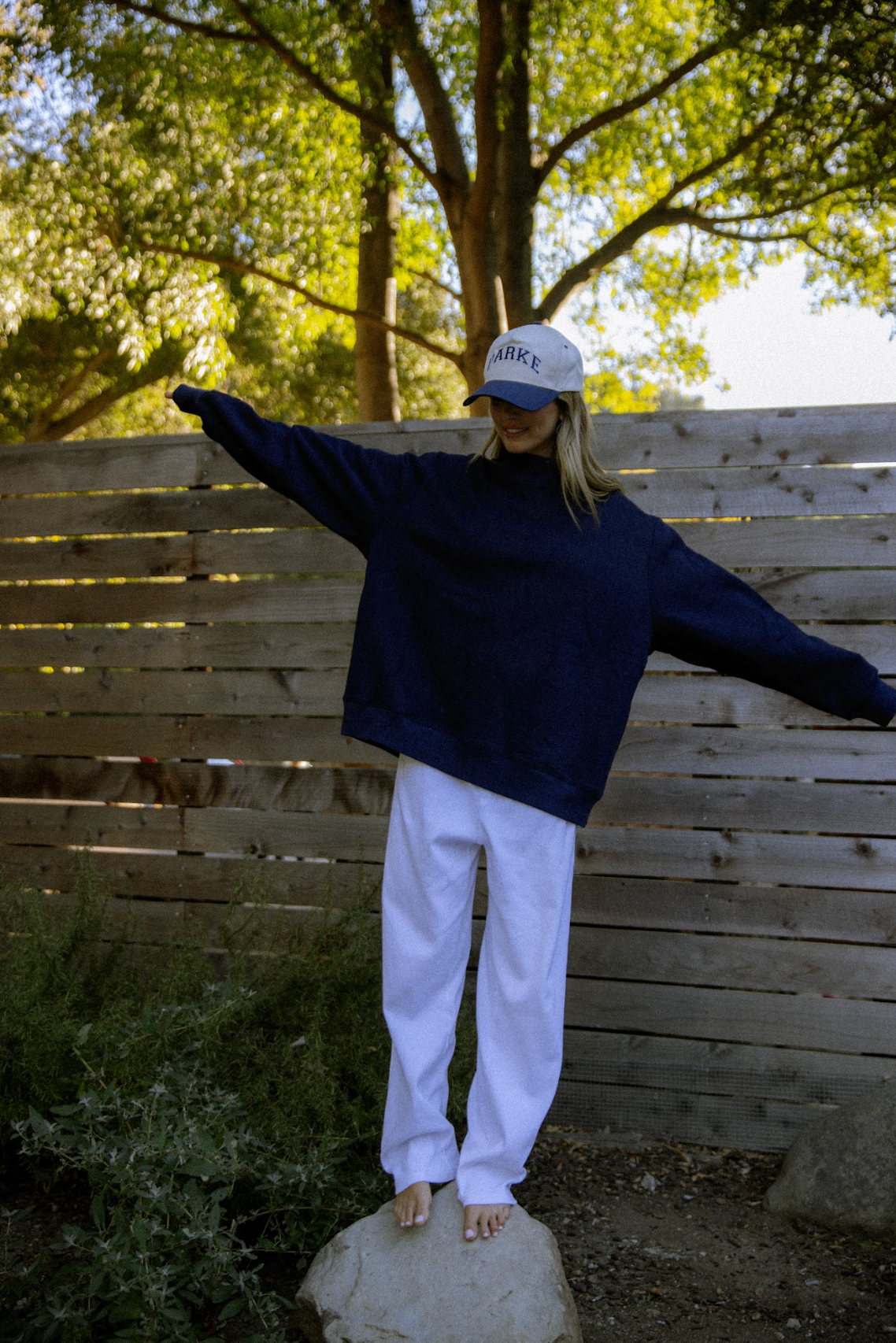 full body image of model wearing navy classic mockneck- navy