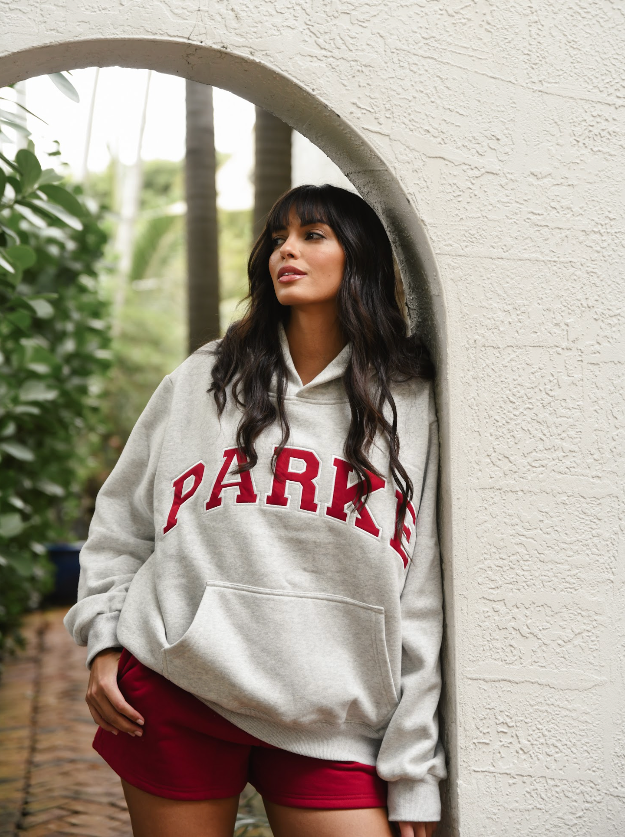 girl wearing classic grey + maroon hoodie- classic grey + maroon