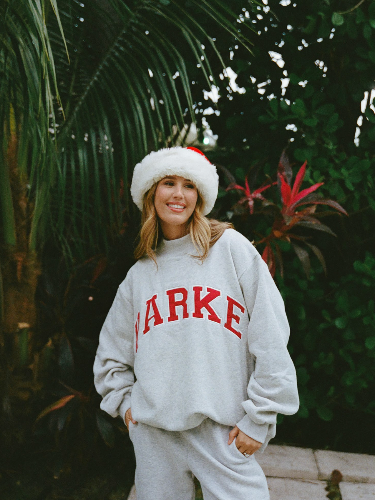 girl wearing classic grey + maroon varsity mockneck- classic grey + maroon