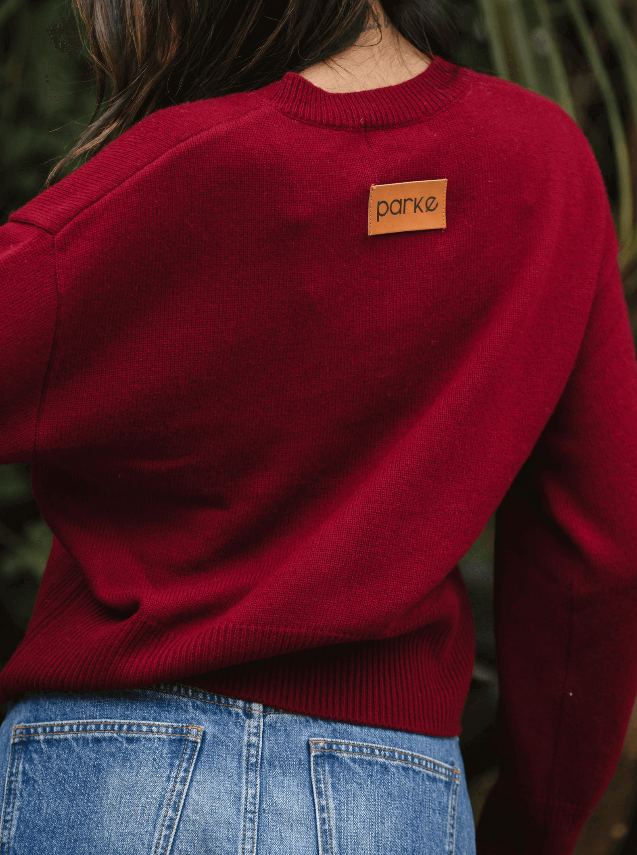 girl wearing burgundy cardigan- burgundy