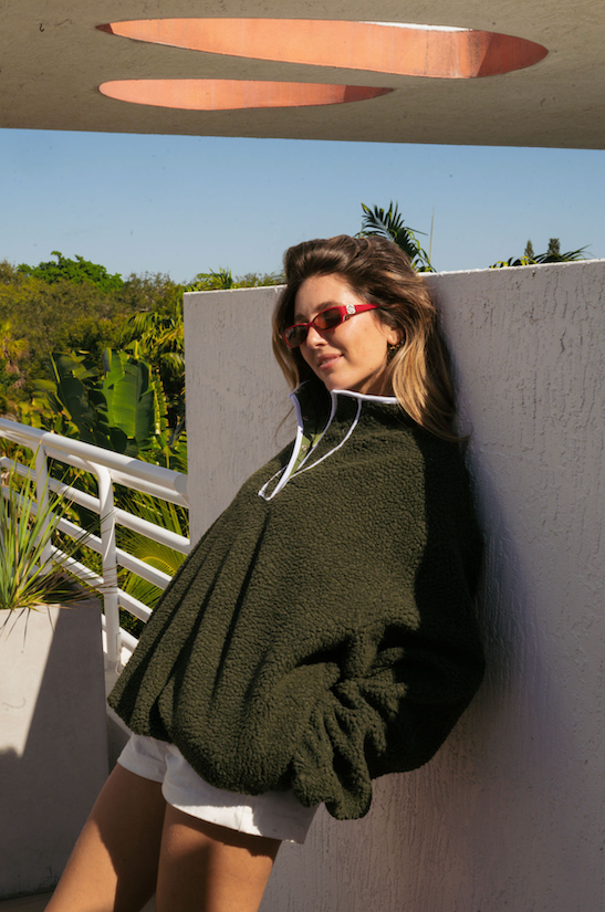 girl wearing hunter green pullover fleece- hunter green