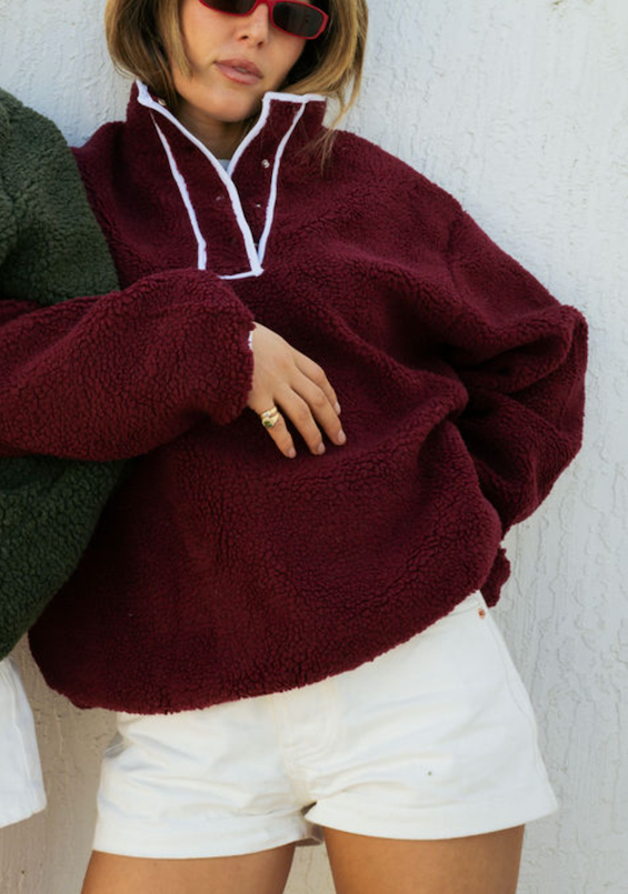 girl wearing maroon pullover fleece- maroon