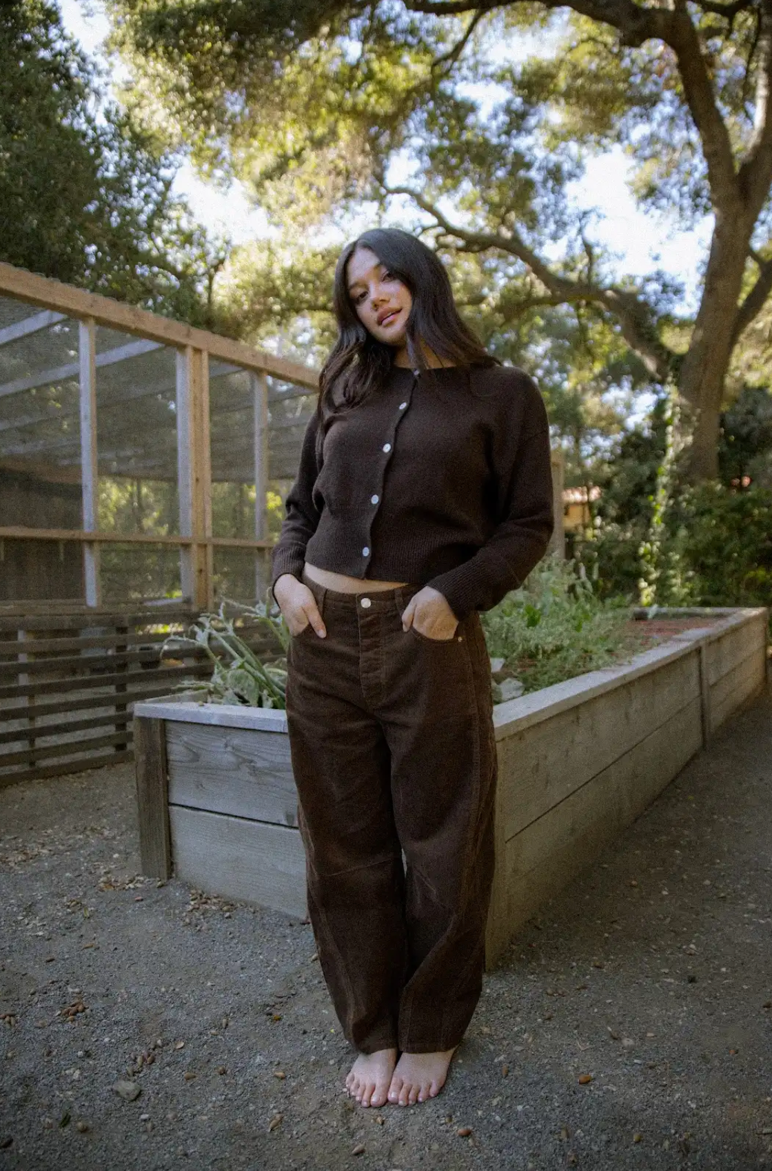 girl wearing chocolate brown cord horseshoe pant- chocolate brown