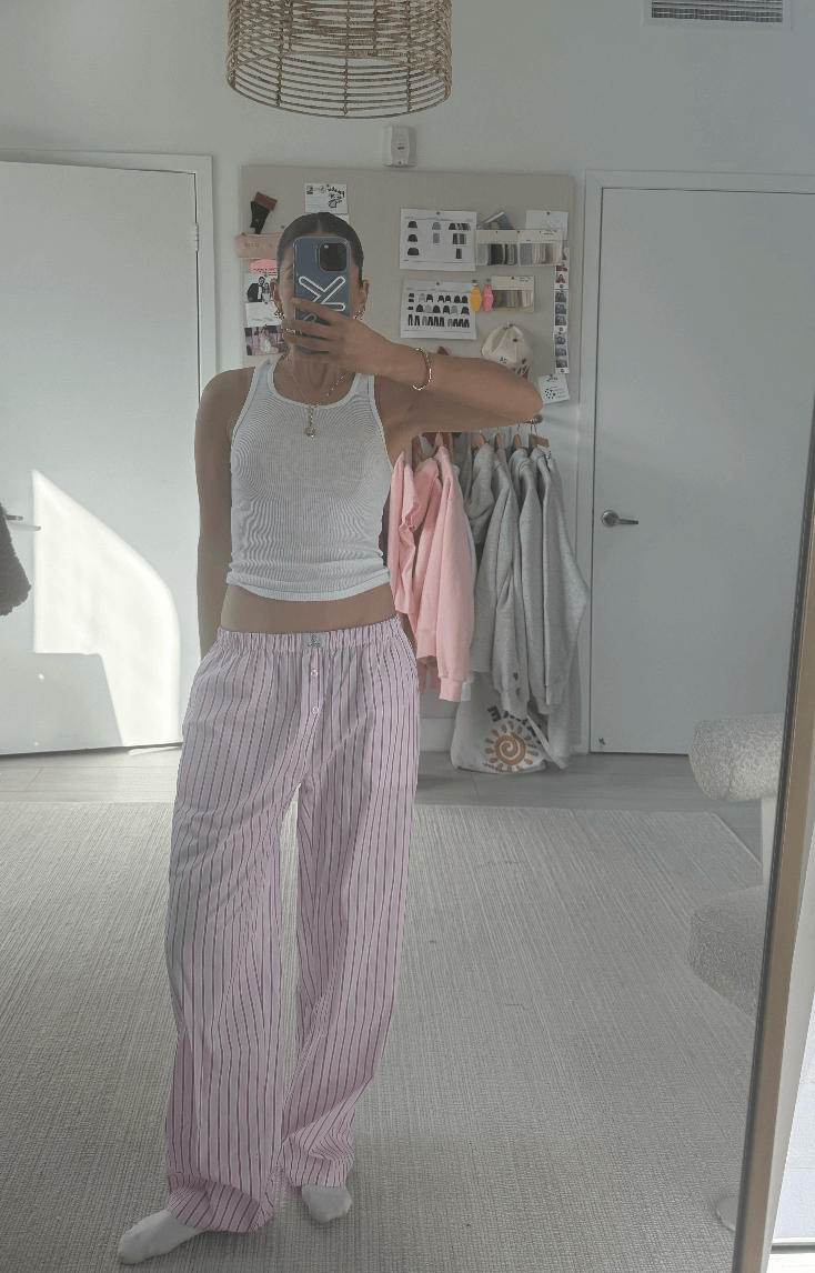 girl wearing light pink stripe boxer frill pants- light pink stripe