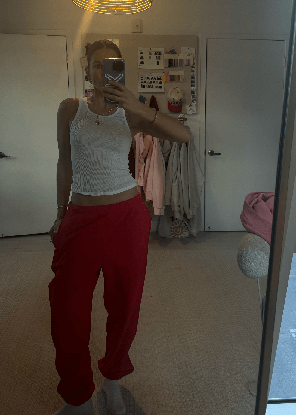 girl wearing ruby unisex sweats - ruby