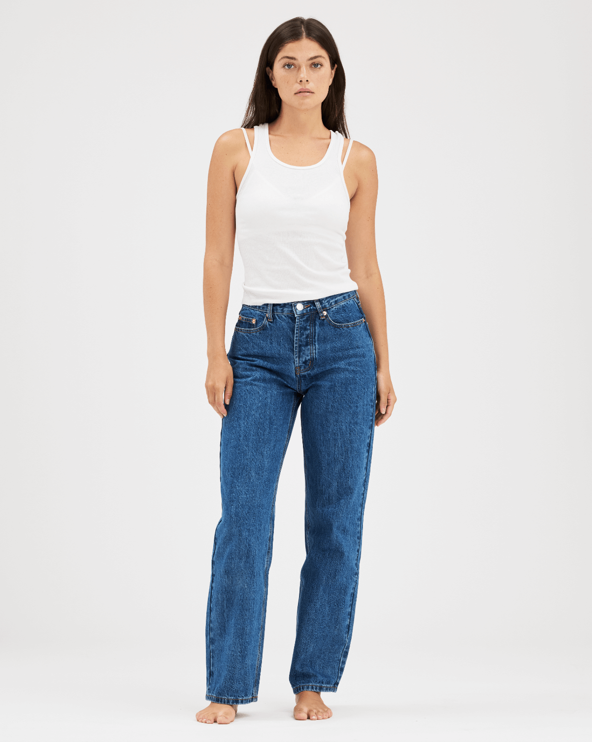 girl wearing med wash classic straight jean - med wash