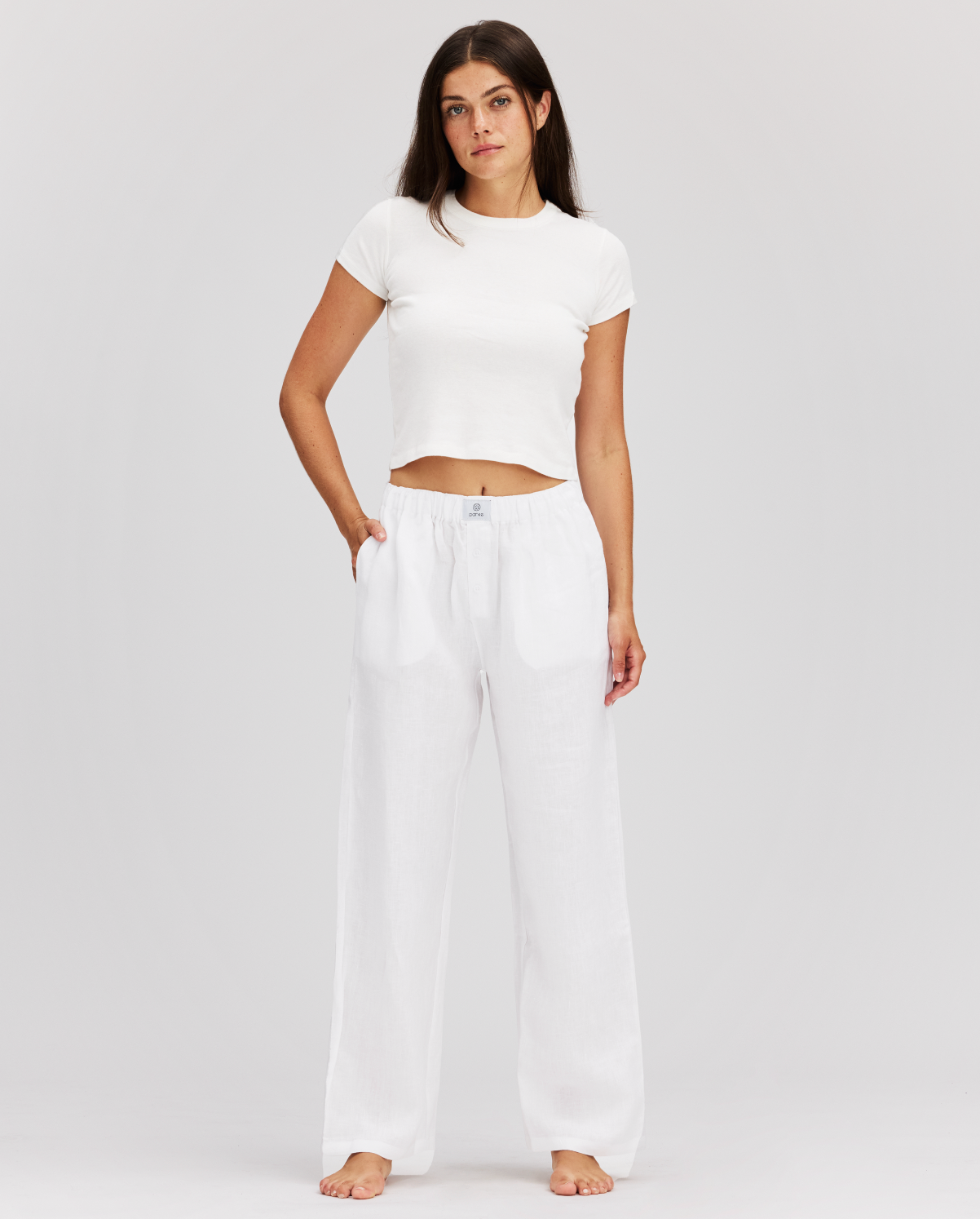 girl wearing white linen boxer pant- white