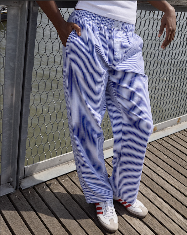 model wearing striped boxer pants - navy stripe