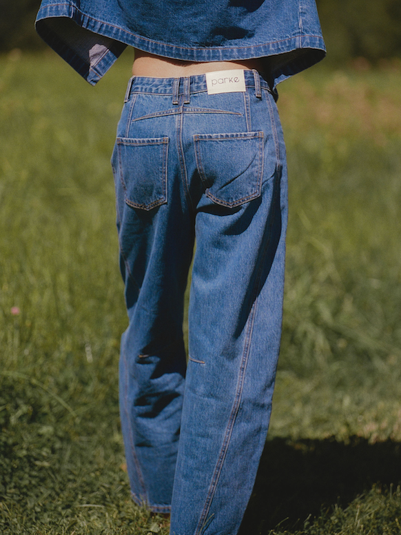 back details of med wash horseshoe jean -  med wash