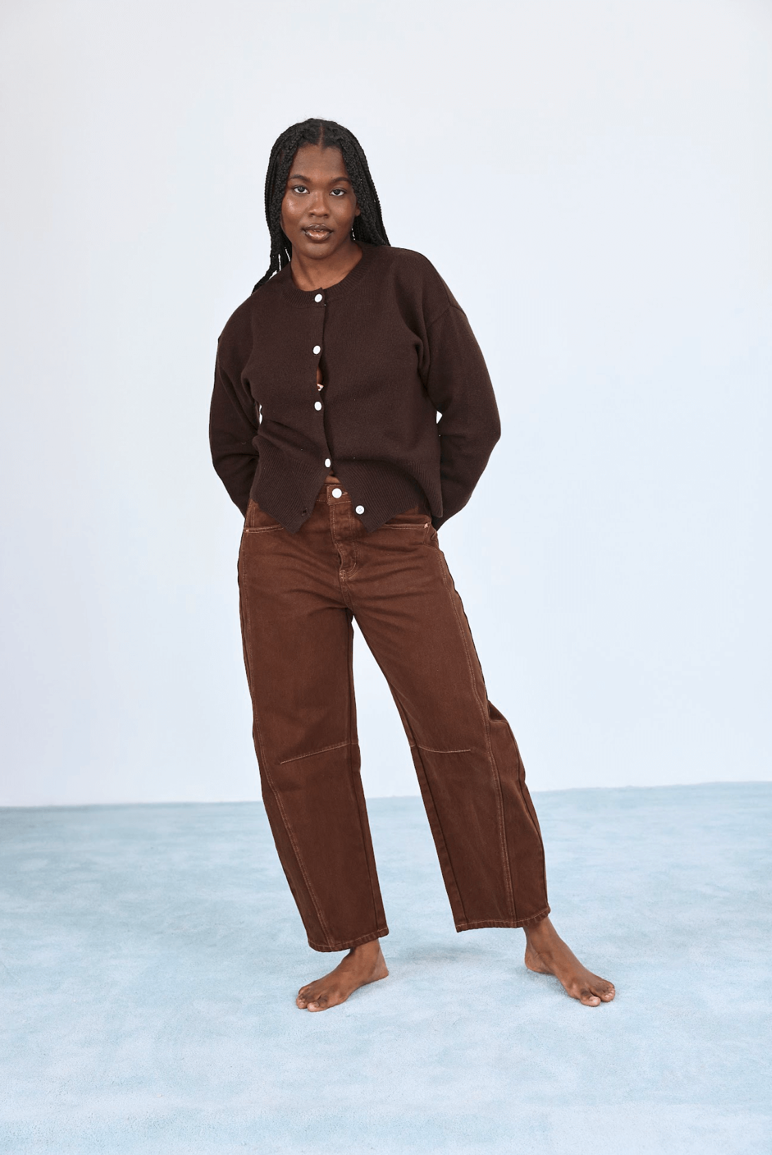 girl wearing chocolate horseshoe jean - chocolate