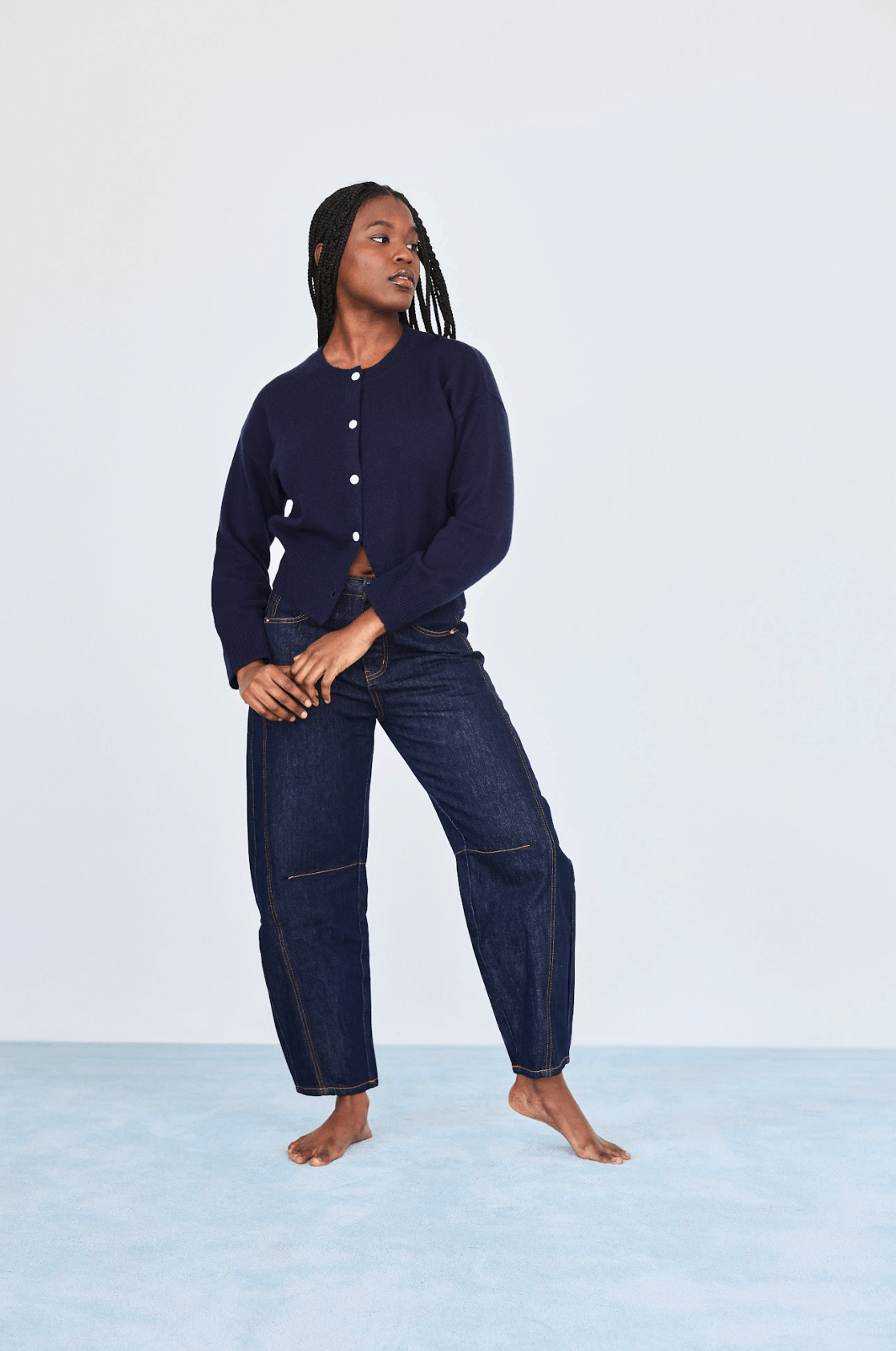 girl wearing dark wash horseshoe jean - dark wash