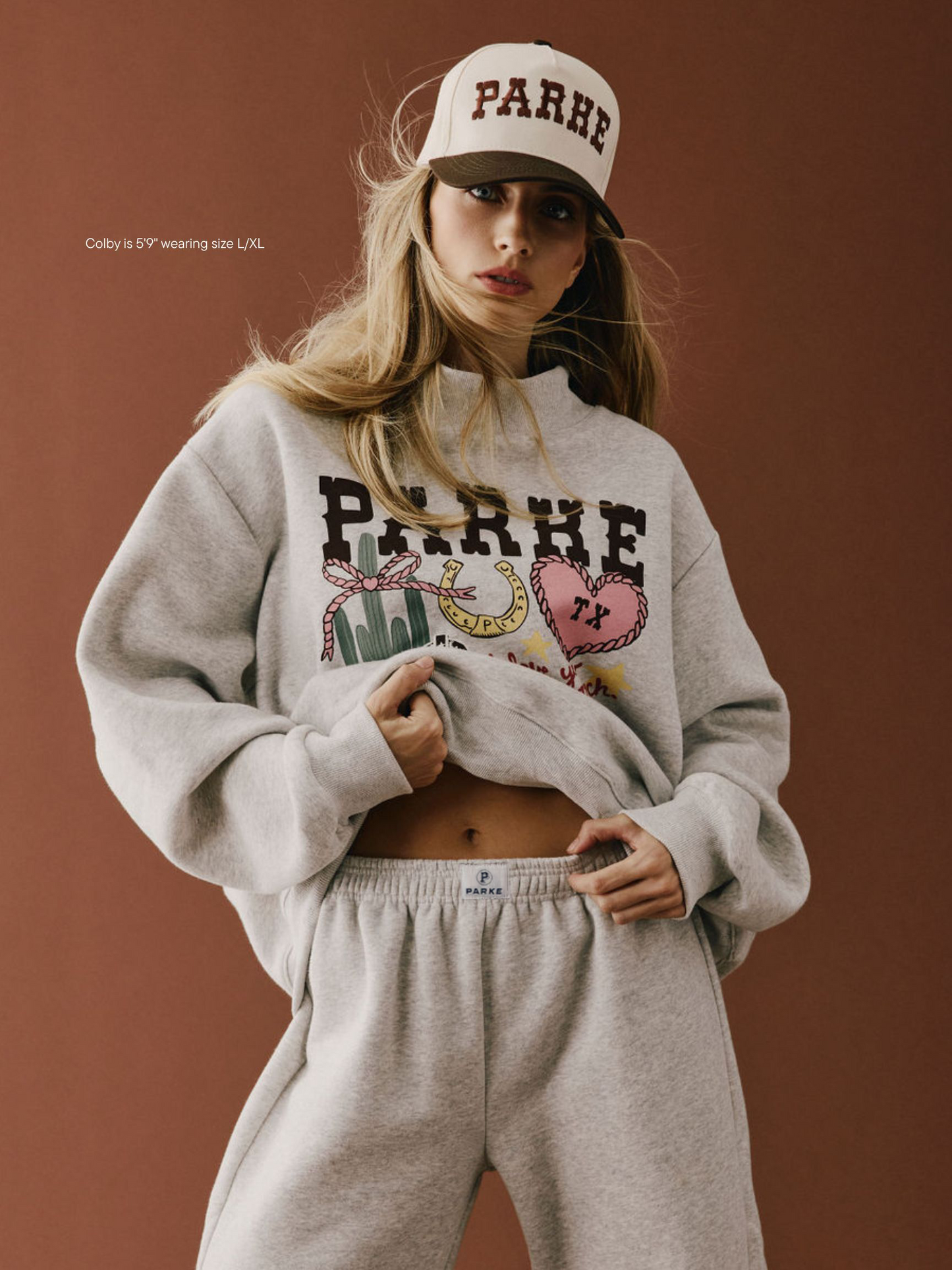 girl wearing Cities Graphic Mockneck -texas