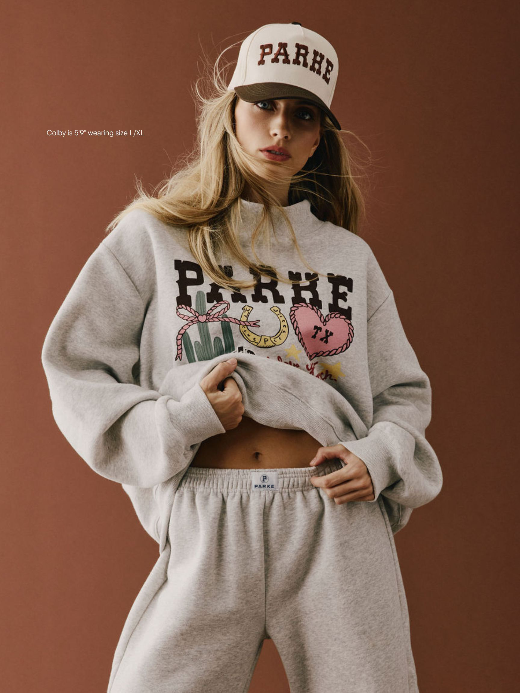 girl wearing Cities Graphic Mockneck -texas