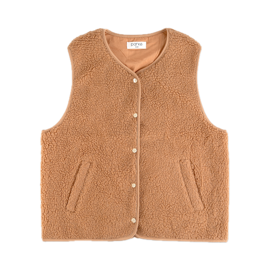 sherpa vest flat lay - caramel