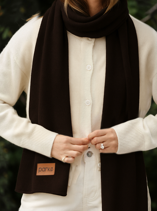 girl wearing brown cashmere scarf flat lay - chocolate