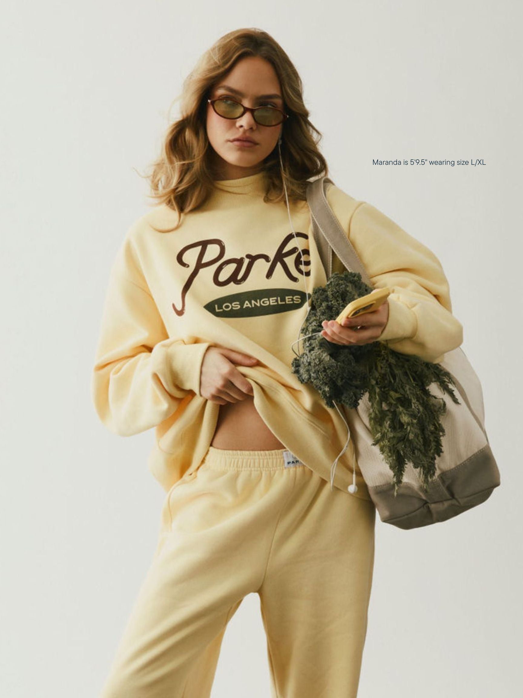 girl wearing Cities Signature Mockneck -peel